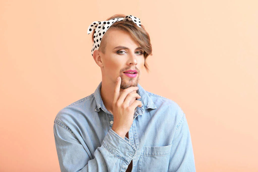 stock-photo-portrait-of-young-transgender-woman-on-color-background @ Happytoys Sexshop: online sex shop for Feeling Happy & Easy 😊 the erotic store owned by a woman